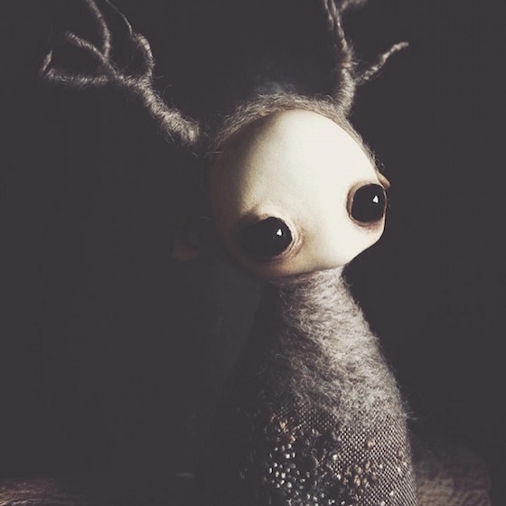 Mahlimae's doll with branches posed to look like horns
